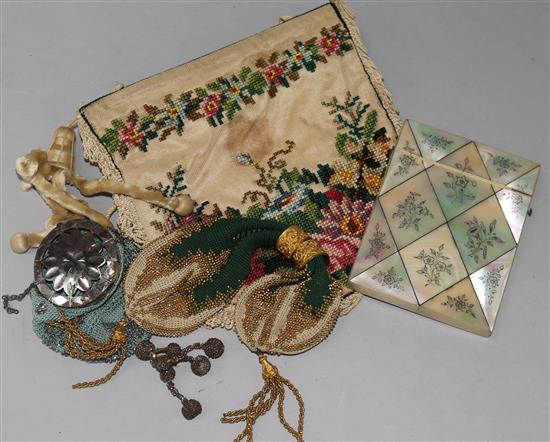 A Victorian mother of pearl calling card case, two sovereign cases and a petit point evening bag (4)